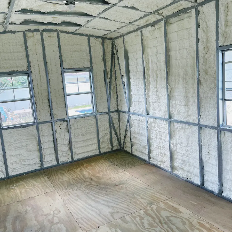 Closed-cell spray foam insulation applied to wall cavities in a residential project in Kinross
